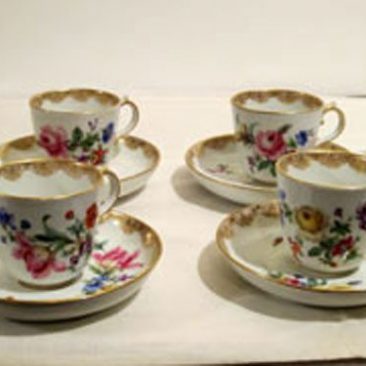 Meissen flowered demitasse cups and saucers