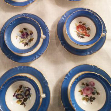 Set of eight Paris Porcelain cups and saucers each painted with different flowers