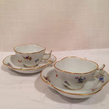 Four Meissen quadrafoil streublumen cups and saucers