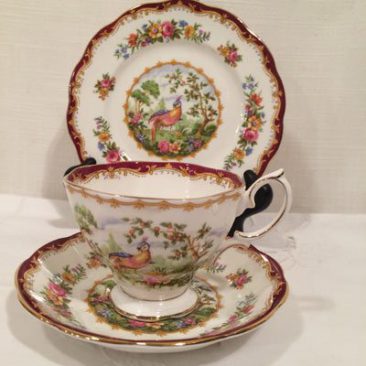 Twelve Royal Albert trios with cup, saucer and cake plate