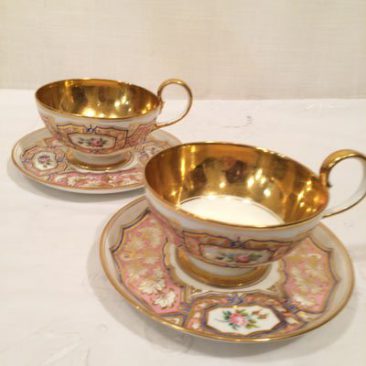 Eleven "Sevres" teacups and saucers